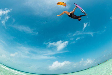 Duotone Soleil Concept Blue twin-tip kiteboard during kitesurfing at a tropical ocean beach