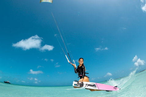 Duotone Soleil Concept Blue twin-tip kiteboard during kitesurfing in a tropical ocean lagoon