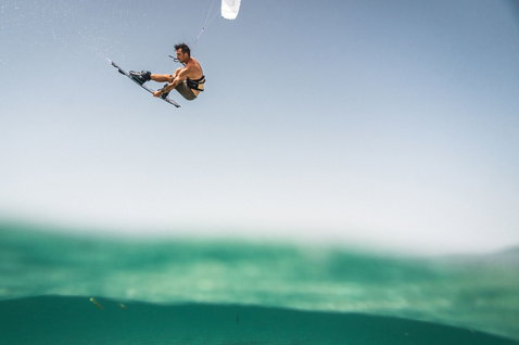 Duotone Boot wake-style kiteboard boot during wakestyle kiteboarding at the Sicily coastline