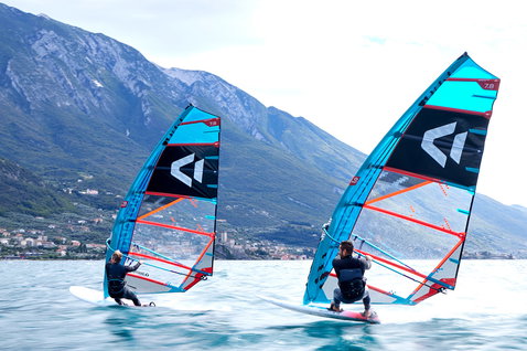 Duotone Warp Fin race sail during windsurfing on an alpine lake