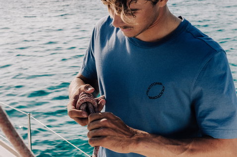 Duotone Apparel Tee SS True Beach men short sleeve t-shirt during beach lifestyle on a boat deck by the ocean