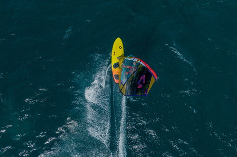 Duotone Ultra FreeWave SLS windsurf board during wave riding on the open ocean