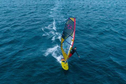 Duotone Ultra FreeWave SLS windsurf board during wave riding on the open ocean