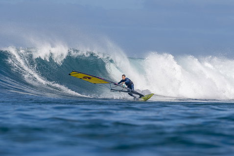 Duotone Ultra Grip [Quad] SLS windsurf board during wave riding in the open ocean