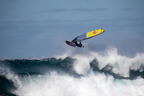 Duotone Super Hero SLS wave sail during wave riding on the ocean