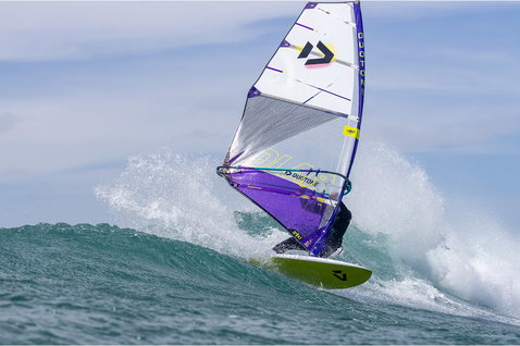 Duotone Ultra Grip D/LAB windsurf board during wave riding in the ocean