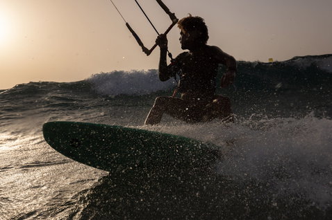 Duotone Whip SLS wave kiteboard during kitesurfing on the ocean