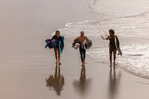Duotone Volt SLS wave kiteboard during kitesurfing at an ocean beach