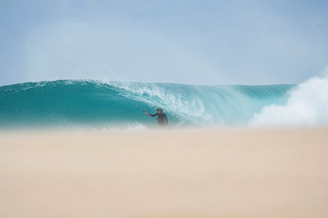 D/LAB LEI kite during wave riding at an ocean beach with large breaking wave