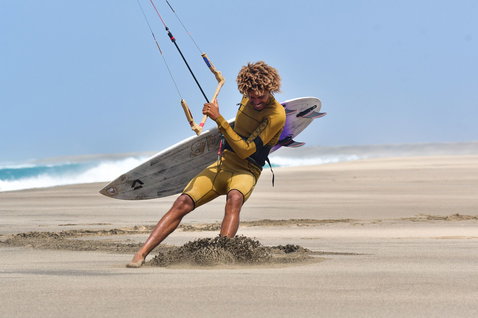 D/LAB LEI kite during wave riding on a sandy ocean beach