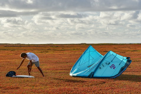 D/LAB LEI kite 10m during kitesurfing preparation in coastal flatland with scrubland