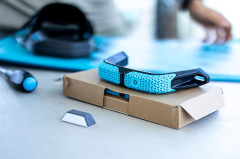 Duotone Big Air Handle en noir et cyan sur emballage avec module WOO