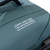 Mala de viagem com rodas Duotone Travelbag em verde-azulado escuro de plástico reciclado, detalhe com estampa Save Our Playgrounds