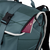 Duotone Daypack 40l em verde-azulado — detalhe do bolso frontal com fecho de correr e passaporte