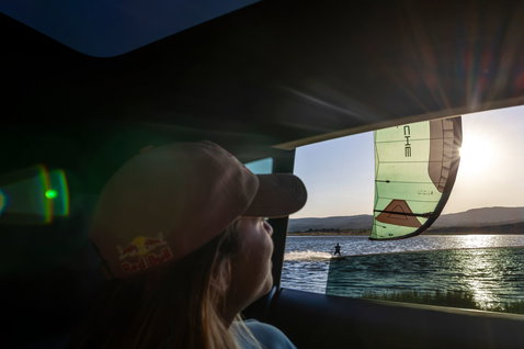 Duotone Evo SLS Porsche Edition LEI kite during kitesurfing on a lake at golden hour