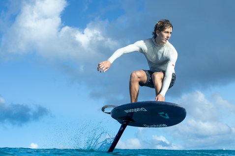 Duotone Crush SLS prone foil board during prone foiling on tropical ocean in Guadeloupe