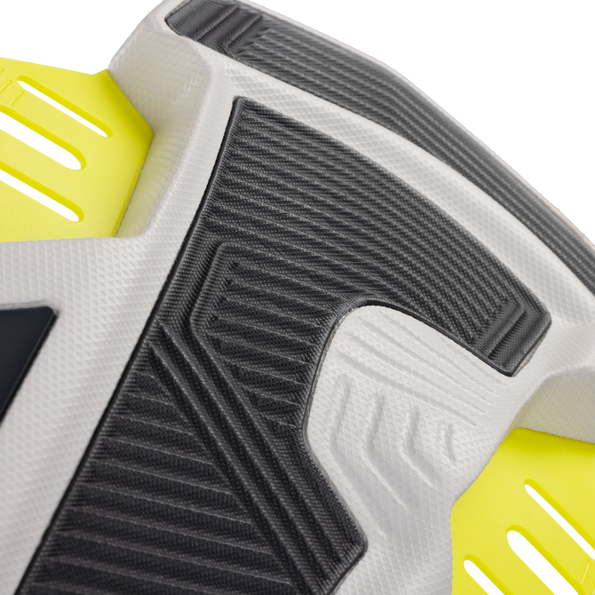Détail du footpad de la fixation de kitesurf Duotone Vario en anthracite, gris clair et jaune néon