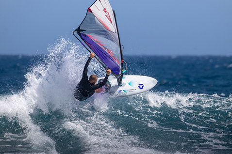 Duotone Cosmic 4 D/LAB windsurf wave board during wave riding on the ocean