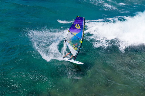 Duotone Super Hero D/LAB wave windsurf sail during wave riding on the ocean