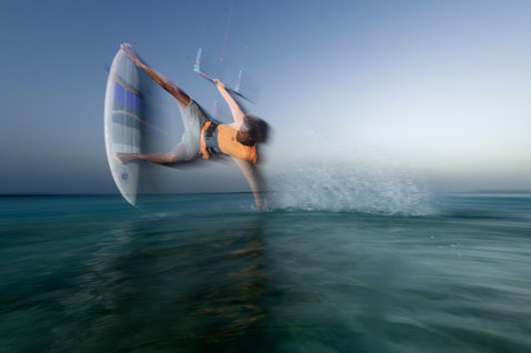Duotone D/LAB Traction Pad Front during strapless freestyle kitesurfing over the ocean