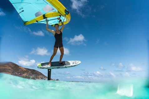 Duotone Skybrid D/LAB foil board during wing foiling in a tropical bay