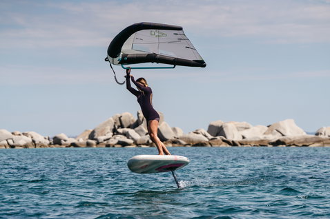 Duotone Skybrid Air wing foil board during wing foiling on the ocean with hydrofoil